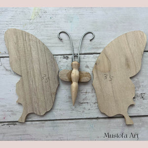 Unpainted Wooden Butterfly Figurines by Mustofa Art