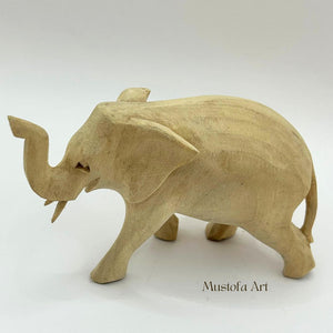 Canadian Unpainted Wooden Elephant Figurines Hand Carved by Mustofa Art