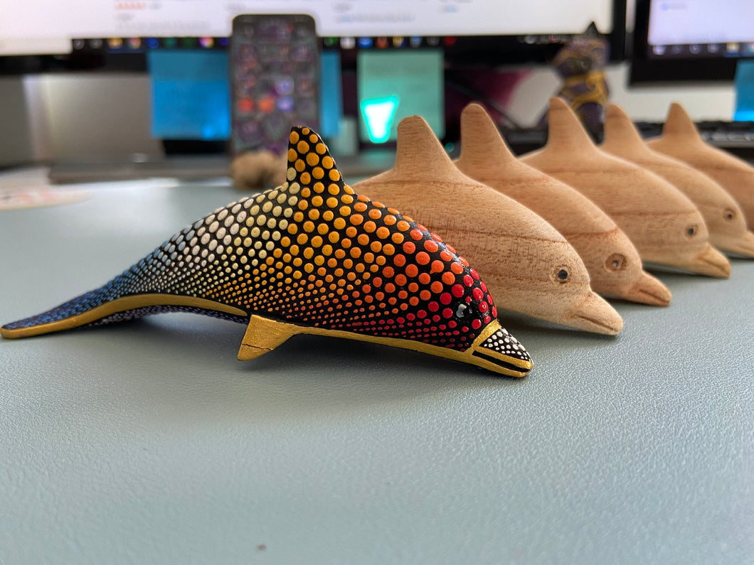 Unpainted Wooden Dolphin Figurine by Mustofa Art